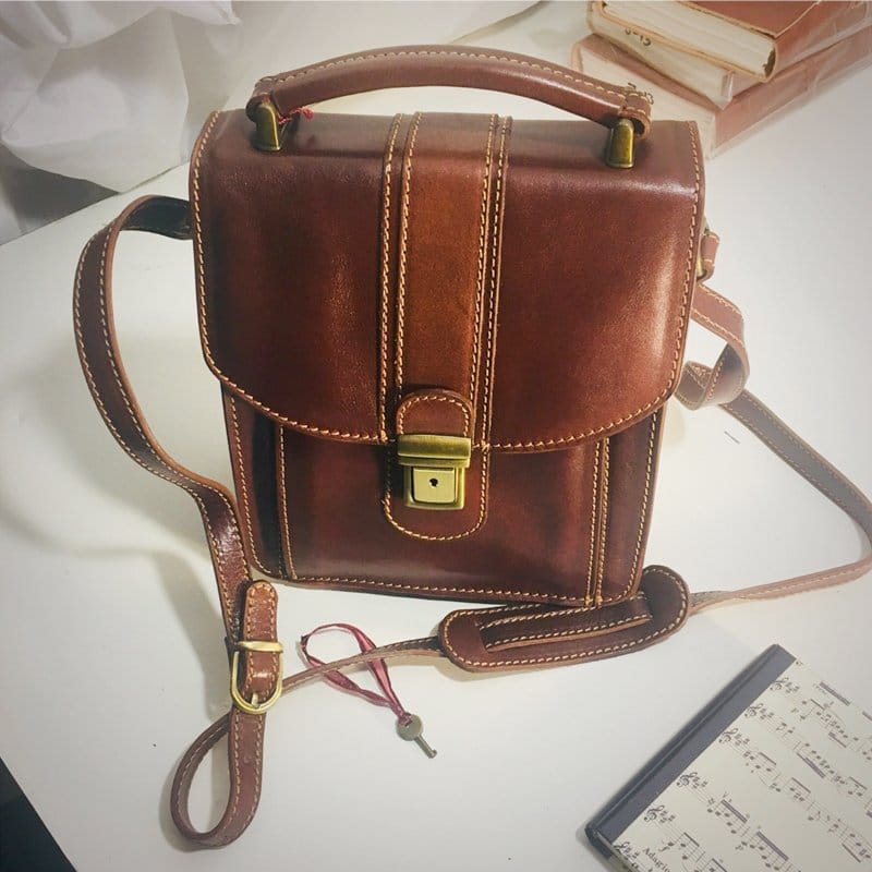 Hand-made in Florence, Italy, our Locking "Reporter Bag" of Finest Italian Leather showcase old-world craftsmanship