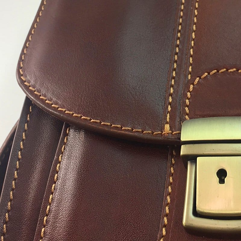 Detail View: When closed the main flap of our Locking "Reporter" Bag holds the contents secure