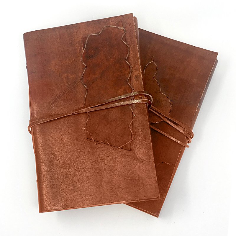 Our Poets Journal of Hand-bound Leather and Handmade Paper makes a great traveling companion.