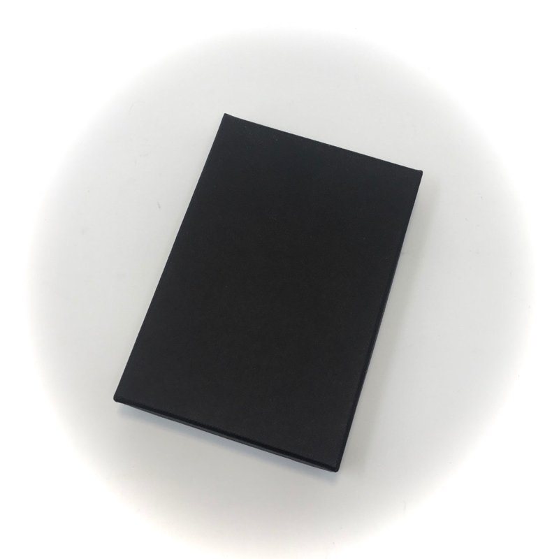 From it's simple black gift box no one will anticipate the colorful surprise inside!