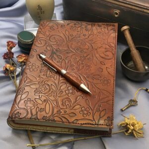 Our "Flora" Handmade Leather Journal comes with your choice of writing or drawing paper.