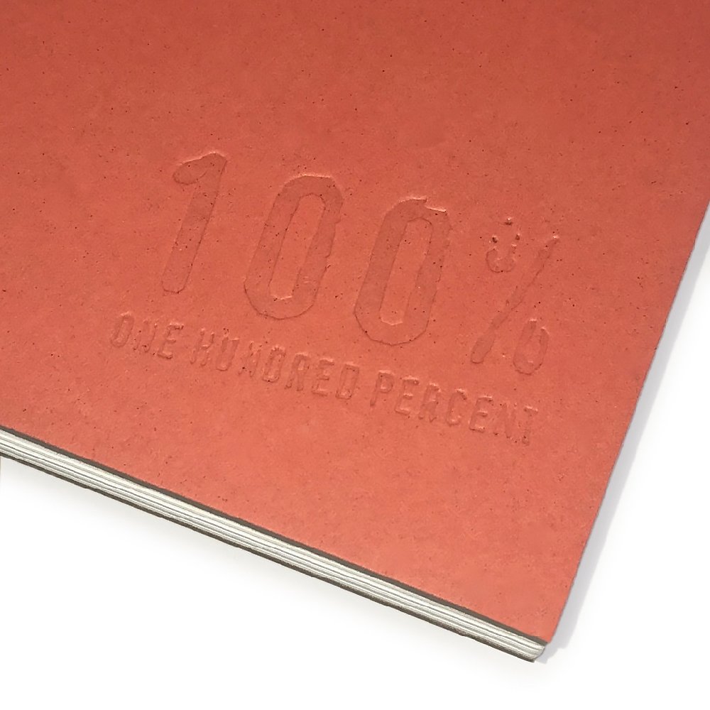 "100% ONE HUNDRED PERCENT" is "debossed" on the cover - very subtle!!